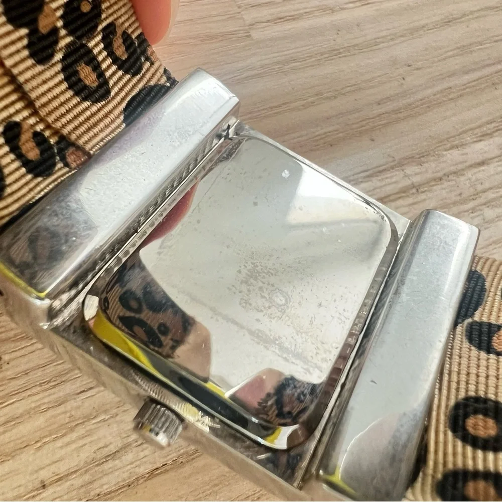 Ladies silver tone cheetah print hinged cuff bracelet watch NEW BATTERY